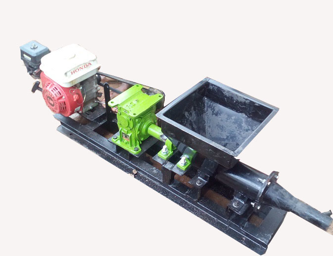 CHARCOAL BRIQUETTE MAKING MACHINE